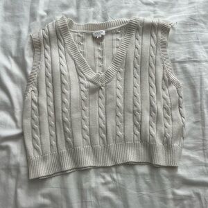 White sweater vest